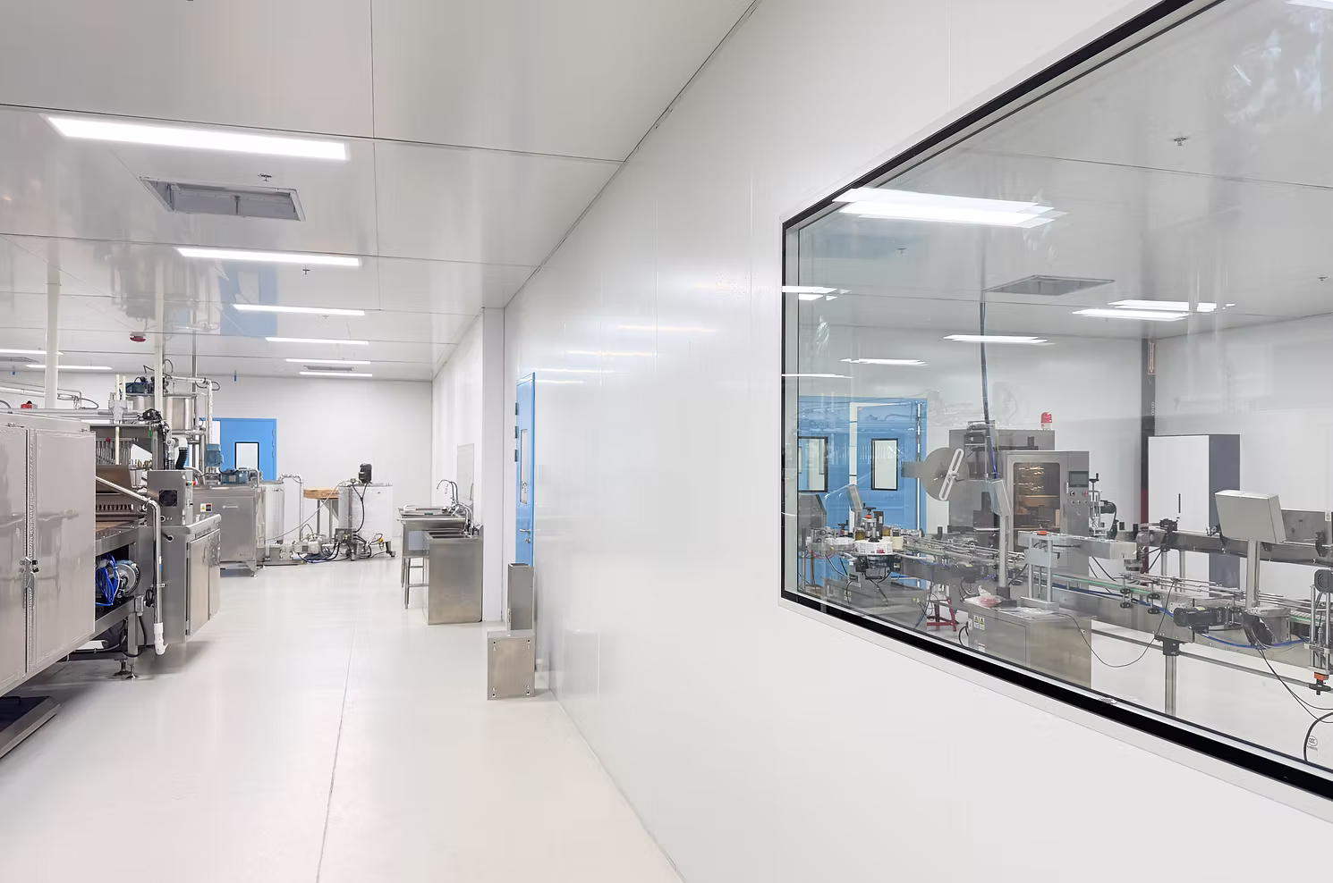 Production area viewed through facility windows